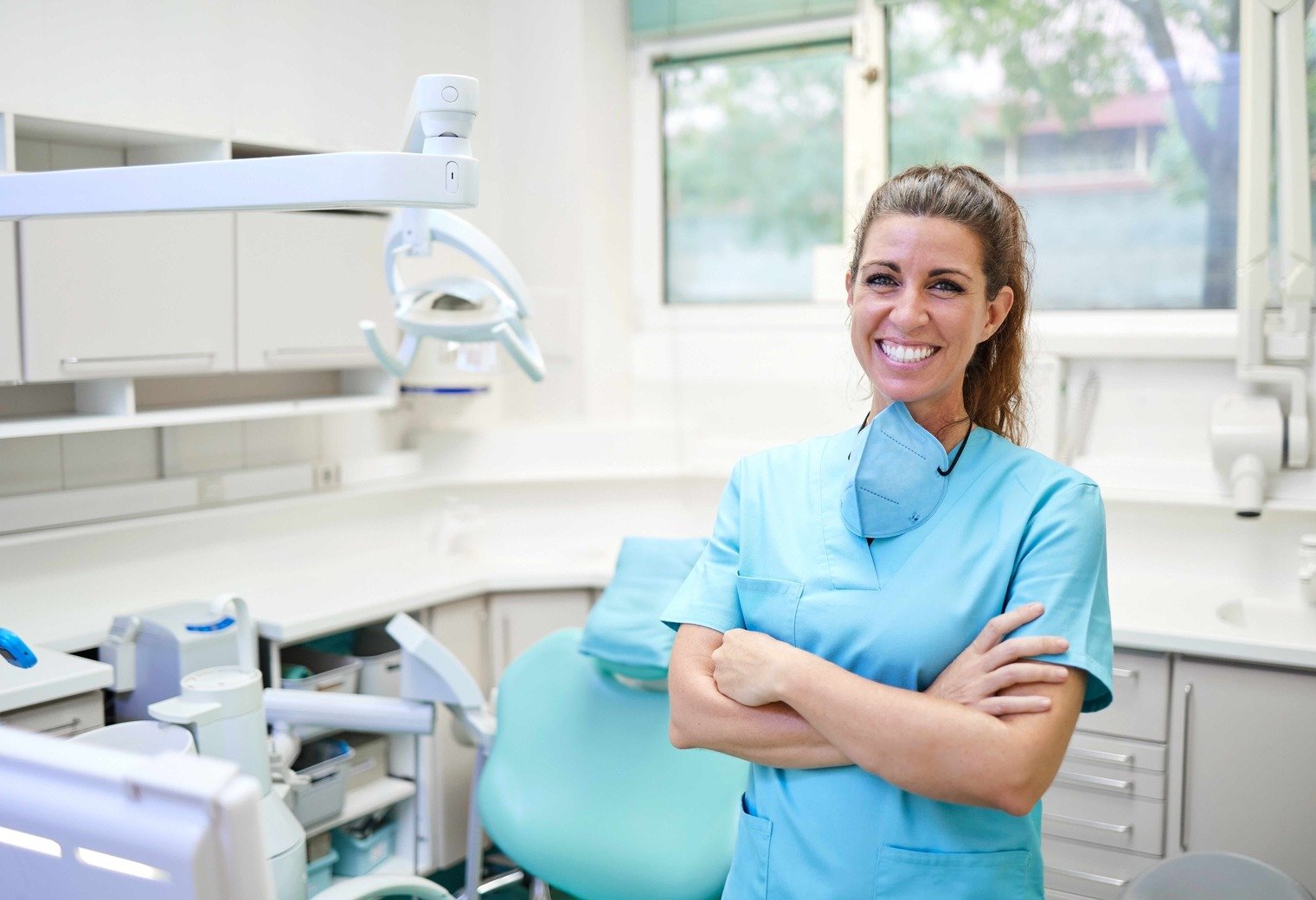cheerful-female-dentist-in-office-2023-01-26-11-23-48-utc (1)